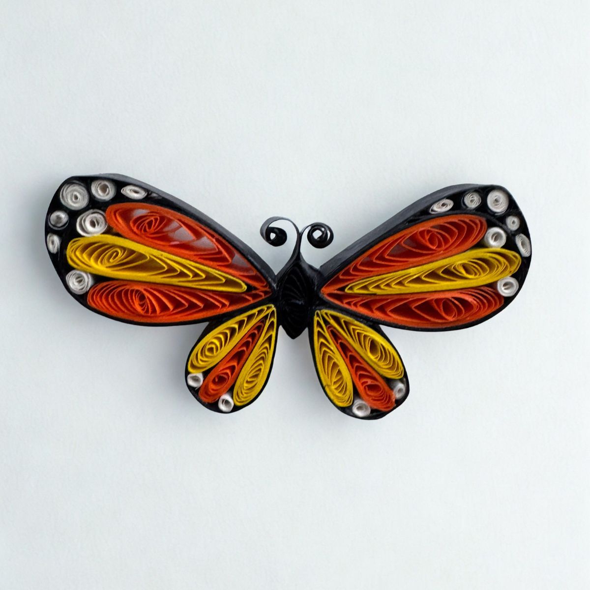 Handcrafted paper quilled butterfly fridge magnet available in Lavender Emperor, Blue Morpho, Emerald Swallowtail, Red Lacewing and Monarch colour variants.