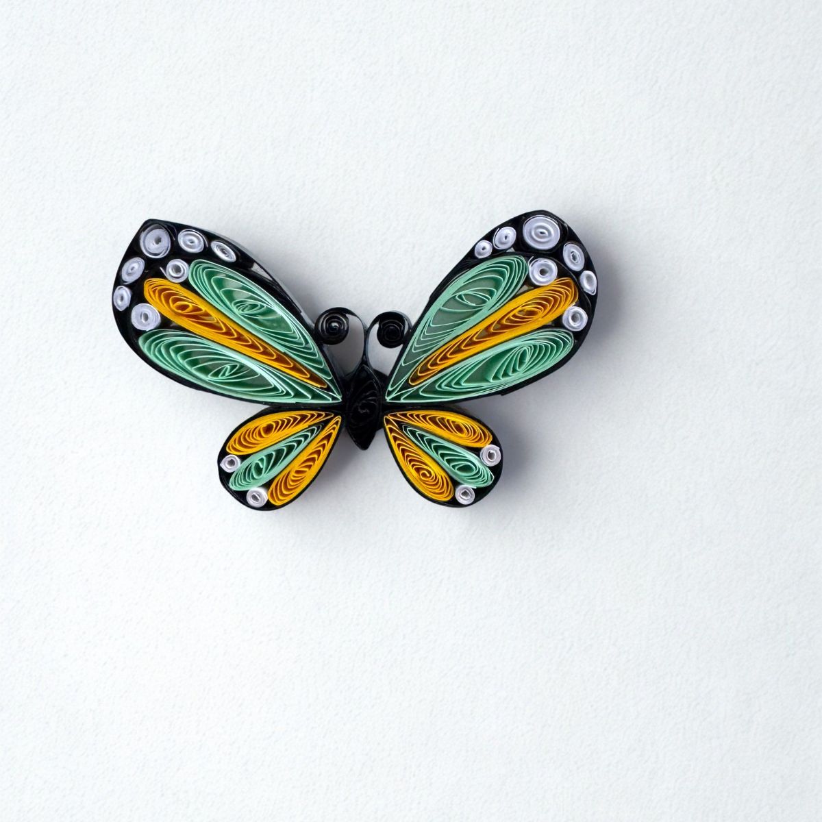 Handcrafted paper quilled butterfly fridge magnet available in Lavender Emperor, Blue Morpho, Emerald Swallowtail, Red Lacewing and Monarch colour variants.