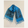 Full turquoise blue hand-painted Madhubani art silk stole displayed vertically, showing border and tassels
