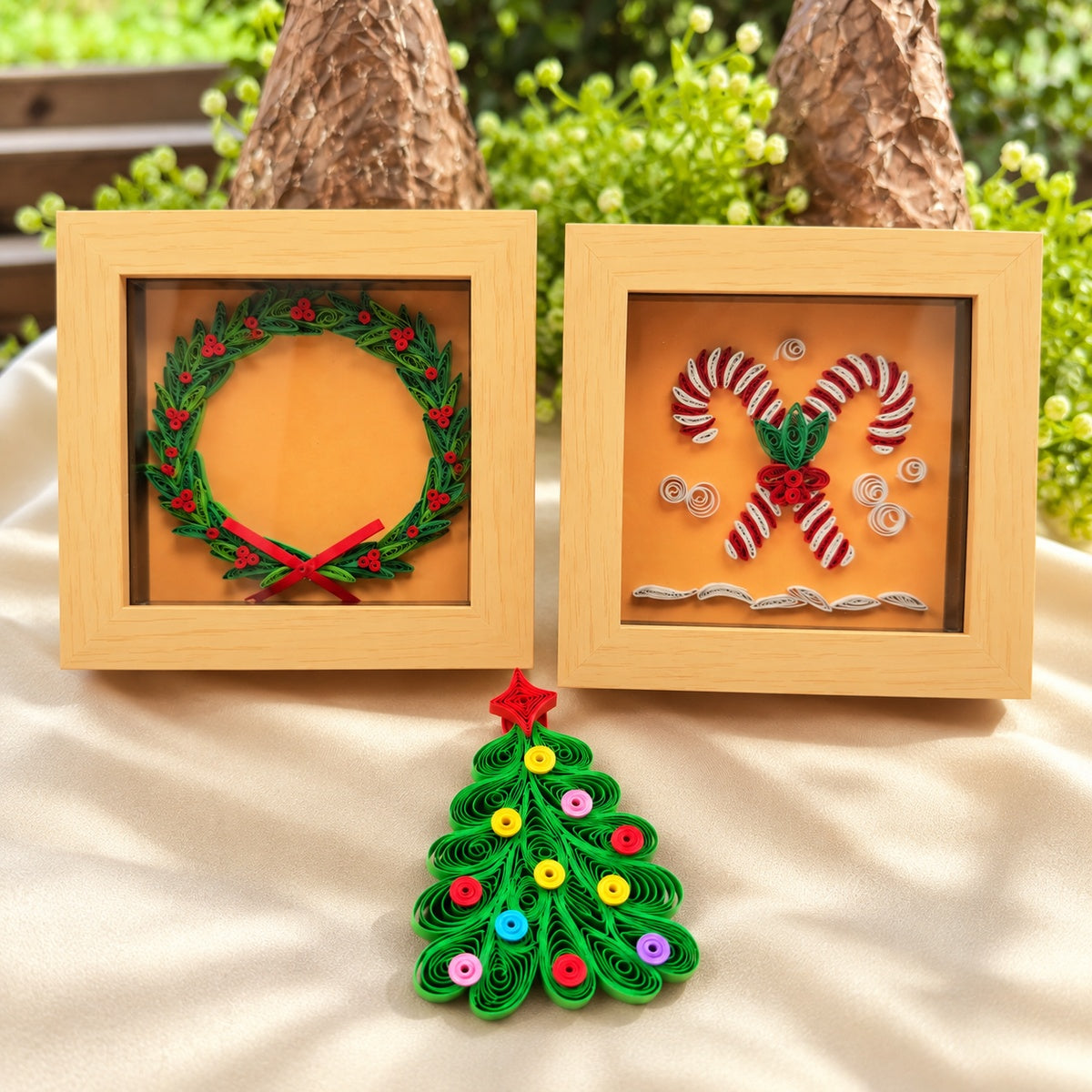Christmas duo hamper with framed wreath and candy cane paper quilling artworks and a colourful Christmas tree fridge magnet.