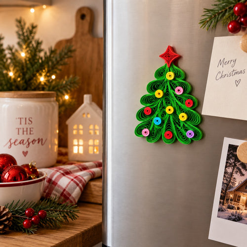 Christmas tree paper quilling fridge magnet styled on a refrigerator in a festive Christmas kitchen.