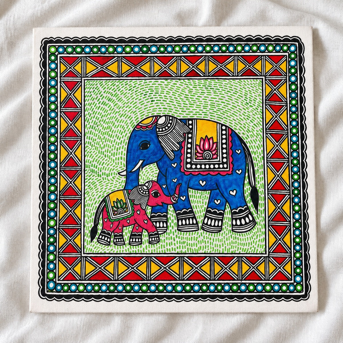 A Gentle Bond blue and pink elephant Madhubani canvas on white linen
