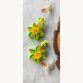 Handcrafted yellow green paper quilling flower stud drop earrings with two-tone petals and pearl-look accents.