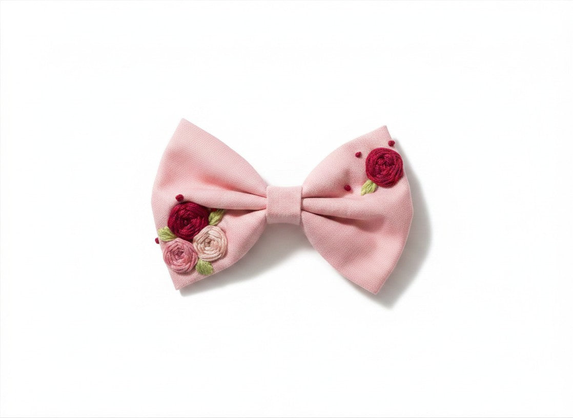 Hand embroidered floral hair bow in soft lavender cotton with crimson pink and blush rose clusters and green leaf stitching