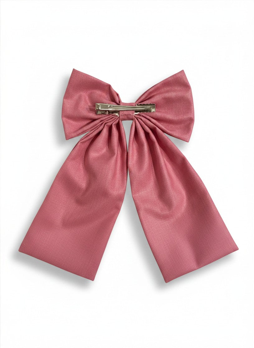 Alligator clip fastening on handmade embroidered lavender sailor hair bow — secure hold for all hair types