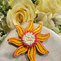 Handmade paper quilled flower fridge magnet in yellow, pink and white