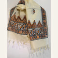 Ivory cream art silk stole hand-painted with orange and black Madhubani fish motifs, geometric borders and tassels