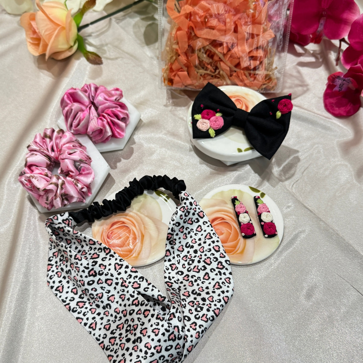 Soft pink Bloom variant of the Little Bloom Hair Accessories Gift Set with multi color floral and leopard print coordinated accessories.