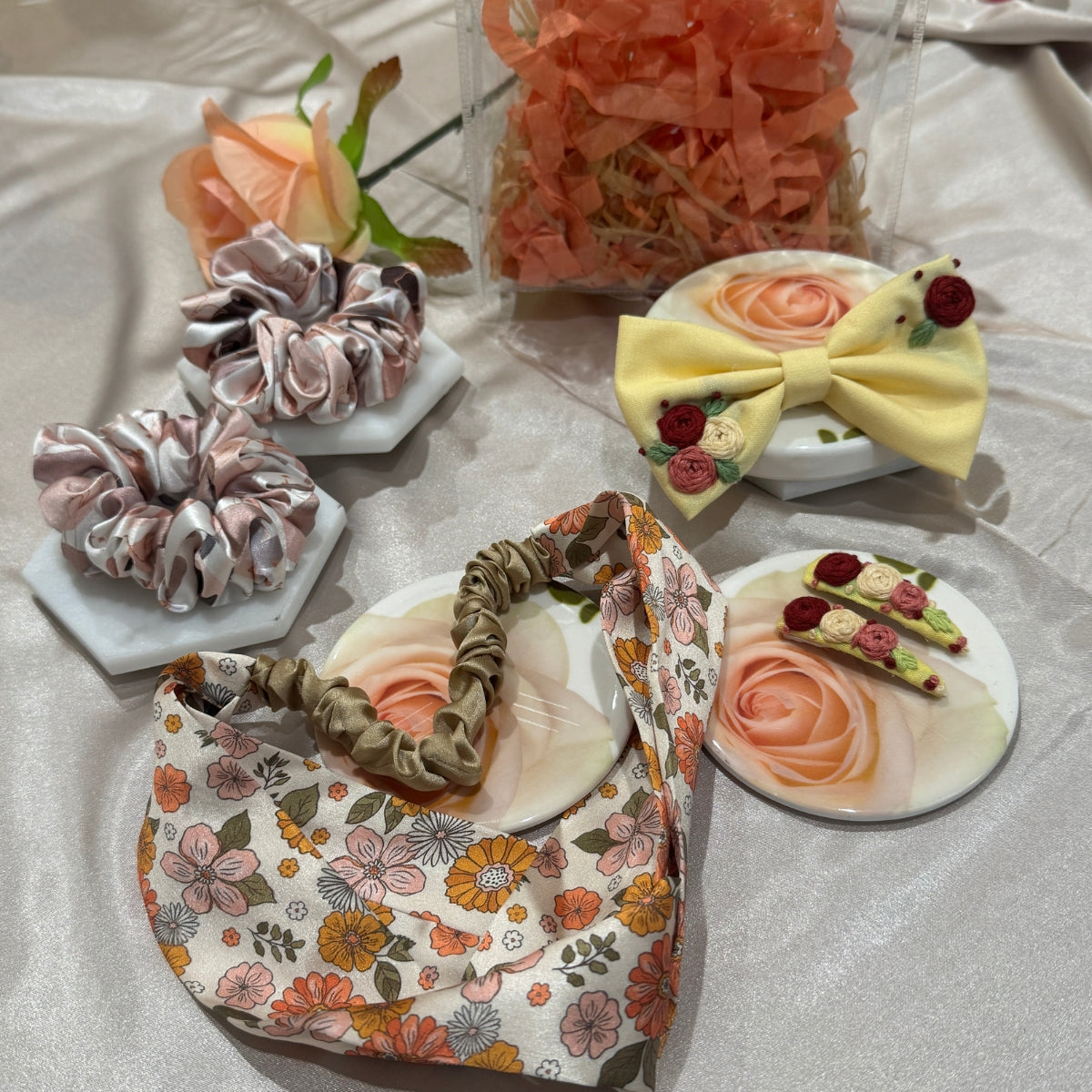 Soft pink Bloom variant of the Little Bloom Hair Accessories Gift Set with multi color  floral pattern coordinated accessories.