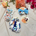 Blue Bloom variant of the Little Bloom Hair Accessories Gift Set with multi color  evil eye pattern coordinated accessories.