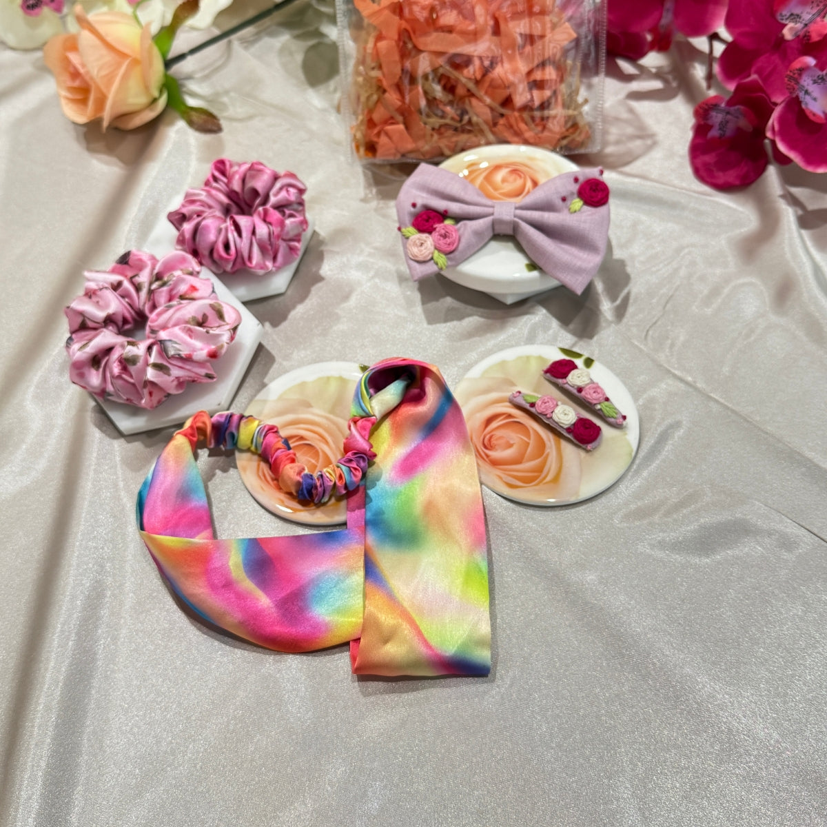 Soft pink Bloom variant of the Little Bloom Hair Accessories Gift Set with multi color rainbow and floral pattern coordinated accessories. 