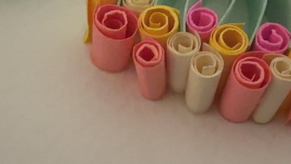 Close up of handmade paper quilling floral design on Mum wall art
