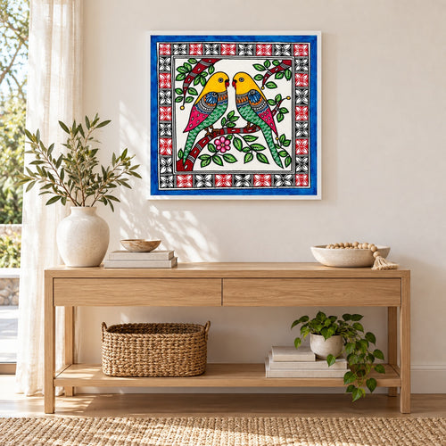 Together in Blossom budgerigar artwork in a white frame above an oak console