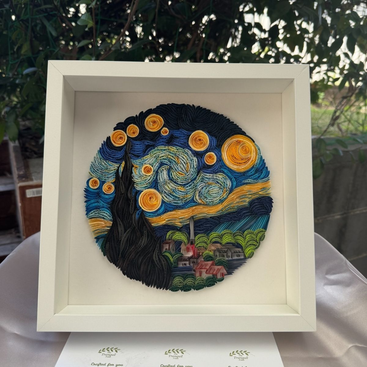 Van Gogh Starry Night paper quilling wall art handcrafted in blue and yellow paper, displayed in a white shadow box frame